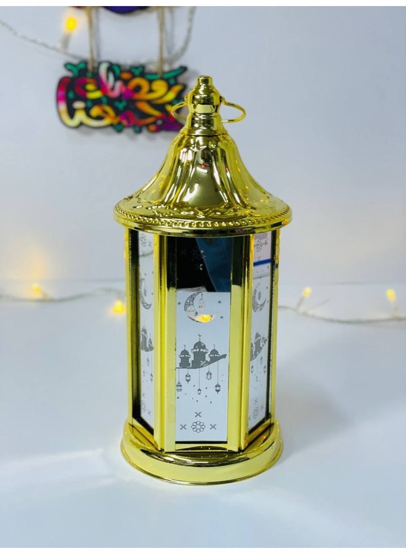 Hexagonal metal Ramadan lantern with printed glass, golden lantern, illuminated with lights and operates on clock batteries. Size: 22 cm - Image 1